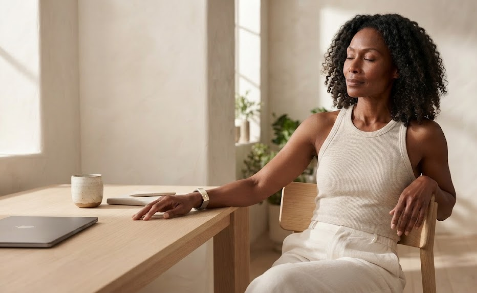 Woman wearing a Vea wellness band